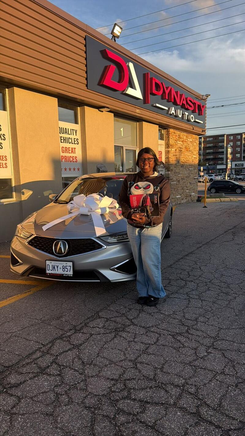 Customer with her new silver Acura ILX